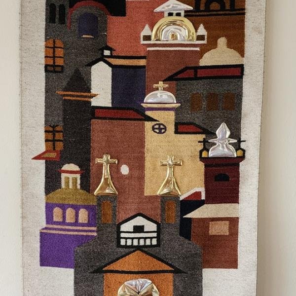 Caceríos andinos en lana y bronce